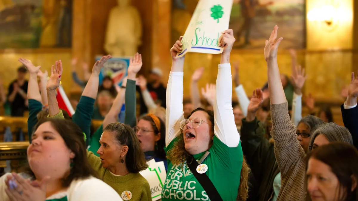KNEA Members and staff rally at the Kansas Statehouse.