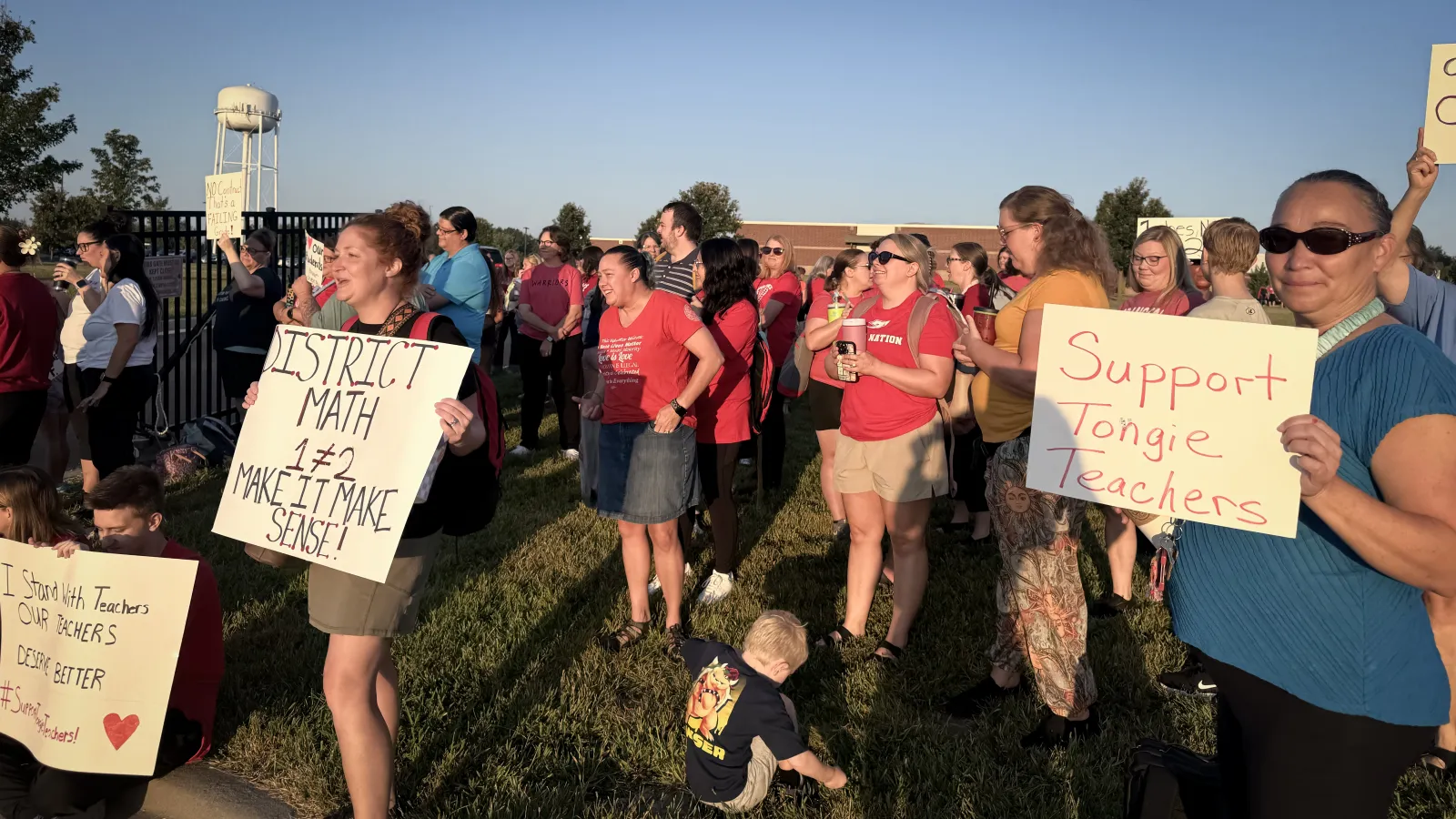 Members of the Tonganoxie Education Association (TEA), Kansas National Education Association (KNEA) and the community gathered in solidaritto advocate for a fair contract and speak out against proposed "double docking" language.