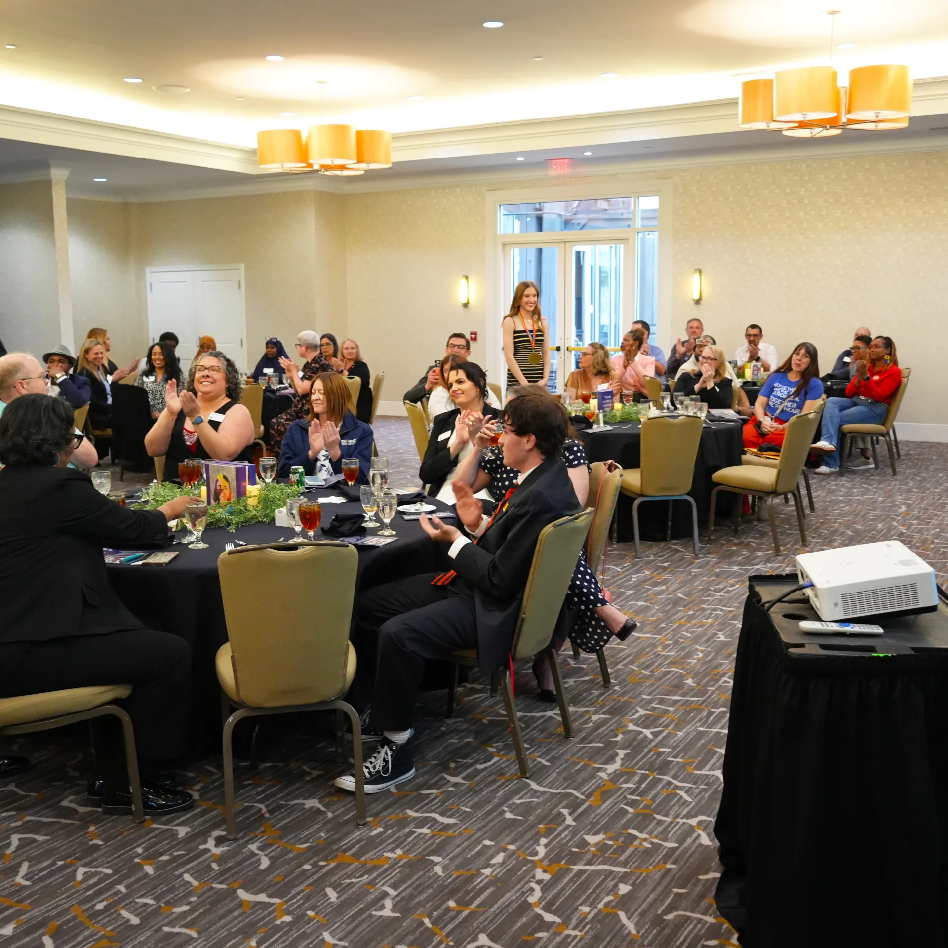 People sitting at tables.