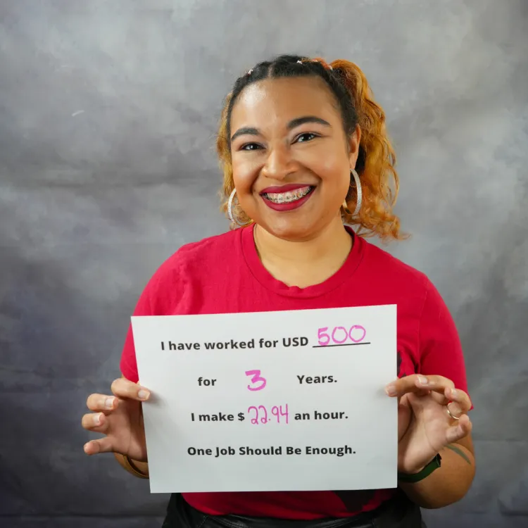 Averie Jackson poses with a sign for the ESP campaign.