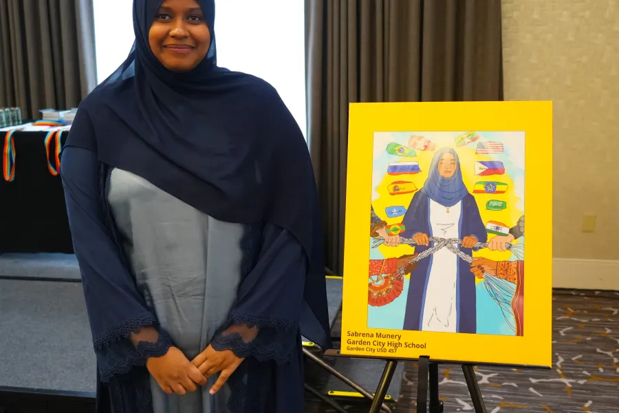 Sabrena Munnery with her Just Imagine Justice 2026 artwork