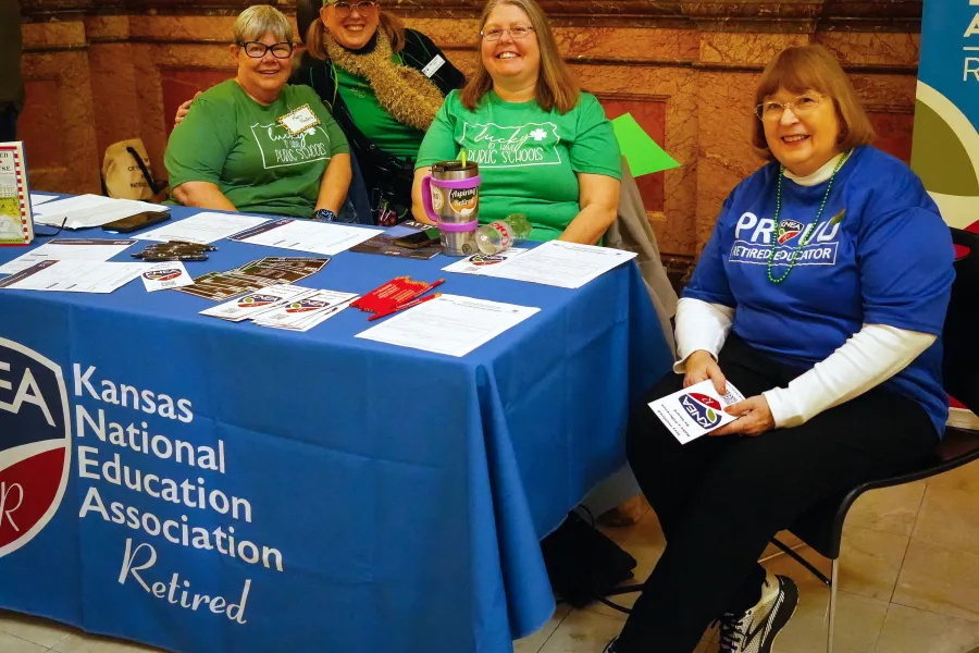 KNEA-Retirees sitting at a table at the Kansas Statehouse.
